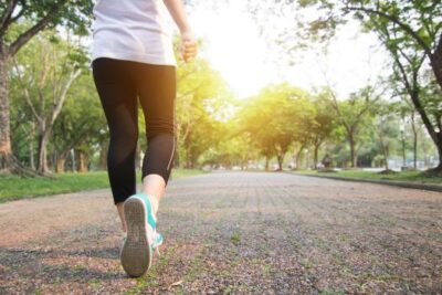 Woman jogging outdoors on a clear spring morning