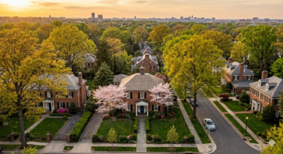 Colonial home in a tree-lined DC metro suburb representing accurate home pricing strategy for DC, Maryland, and Virginia sellers in 2026