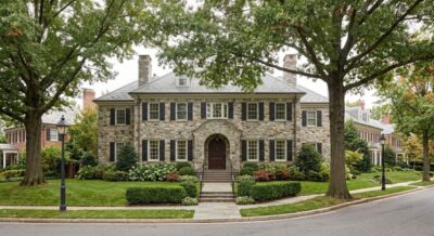 Exterior of a traditional brick luxury home on a quiet residential street in Washington DC